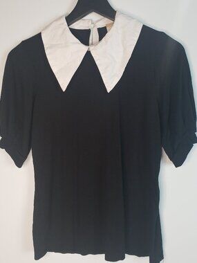 Misia brand black short-sleeve top with a white Peter Pan collar Size S